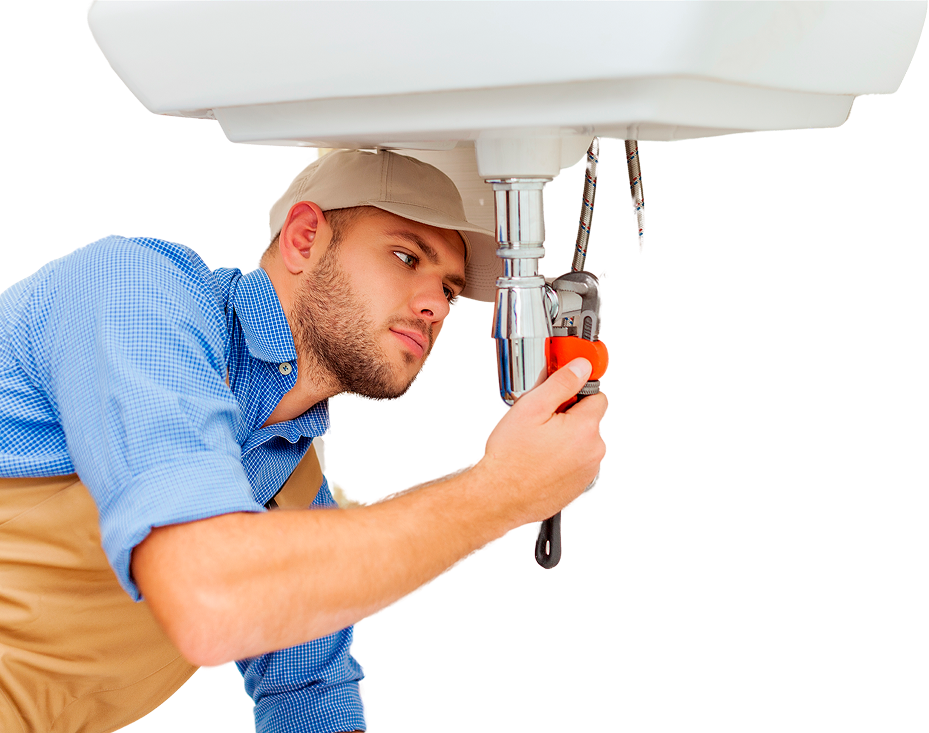 A plumber wearing a cap and blue shirt uses a wrench to fix a pipe under a white sink, providing expert plumbing repairs in Utah County.